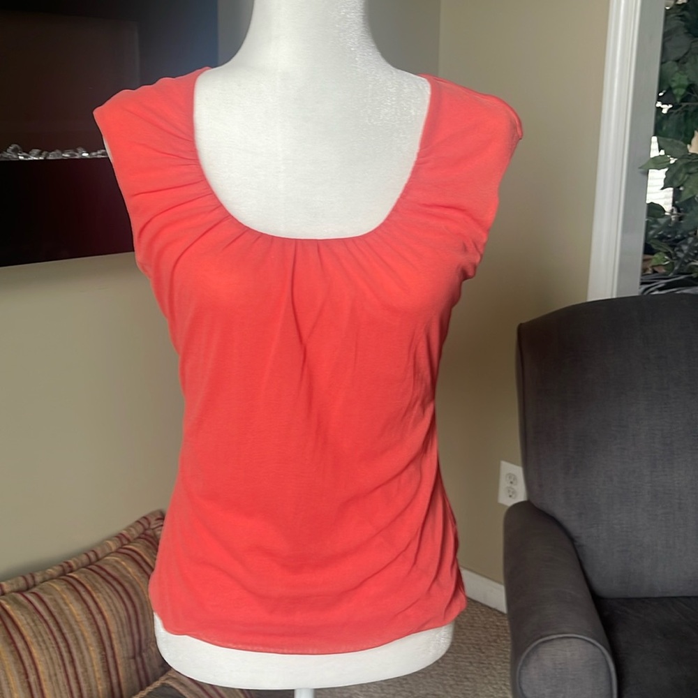 Kenneth Cole Apricot colored mesh blouse. Size:S. Material:100%Nylon.